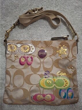 Coach Tan Signature Canvas Crossbody Bag with Multicolor Graphic Accents Rehab